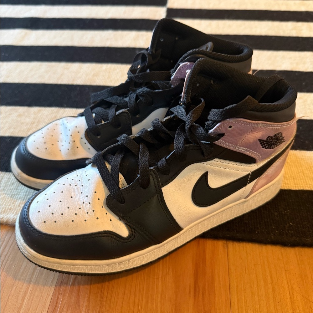 Black and purple Air Jordans